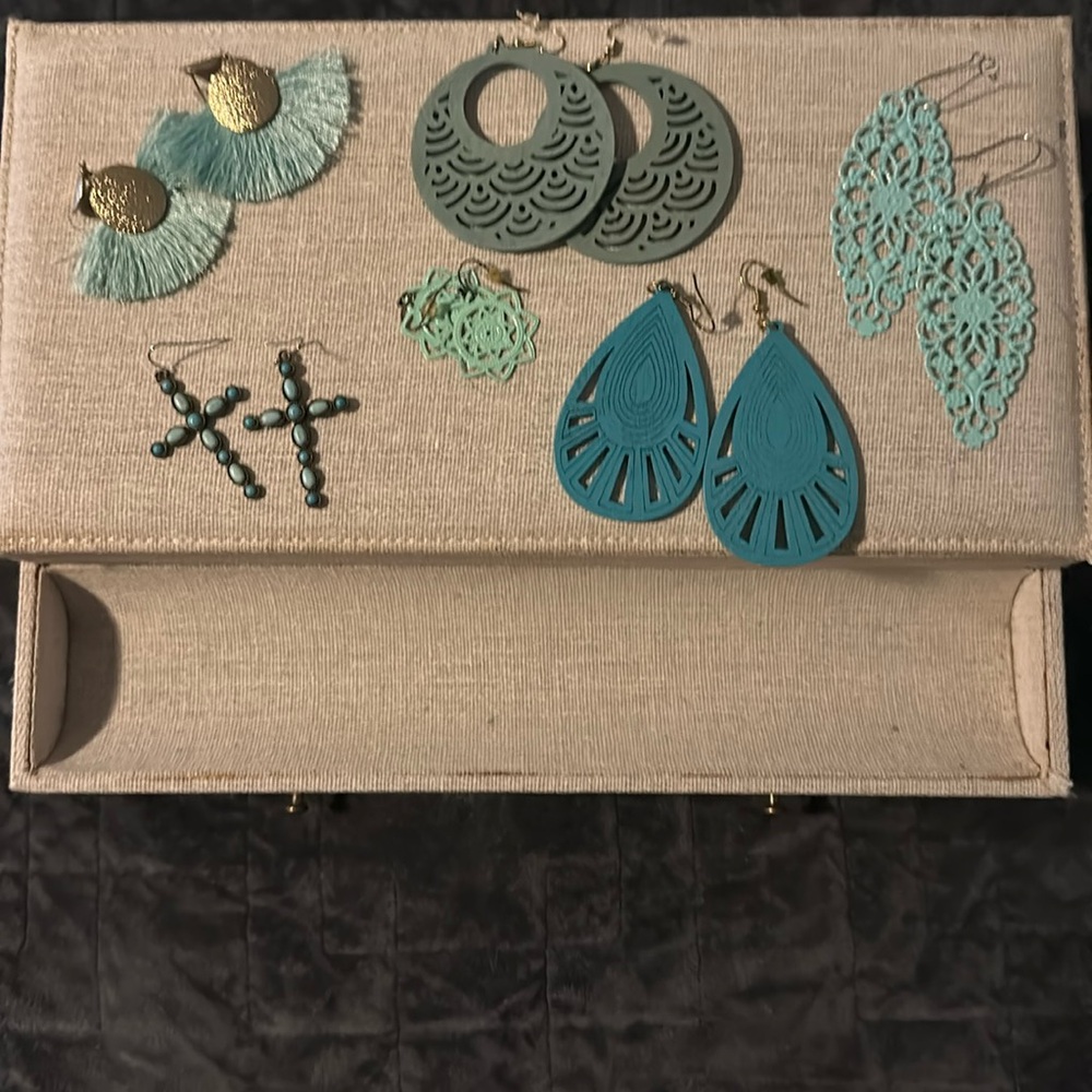 Women’s teal colored earrings